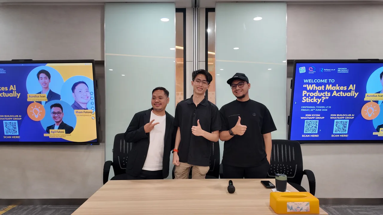 Aurelius Ivan Wijaya as panelist at 'What Makes AI Products Actually Sticky?', with a Build Club slide naming him City Lead at Build Club